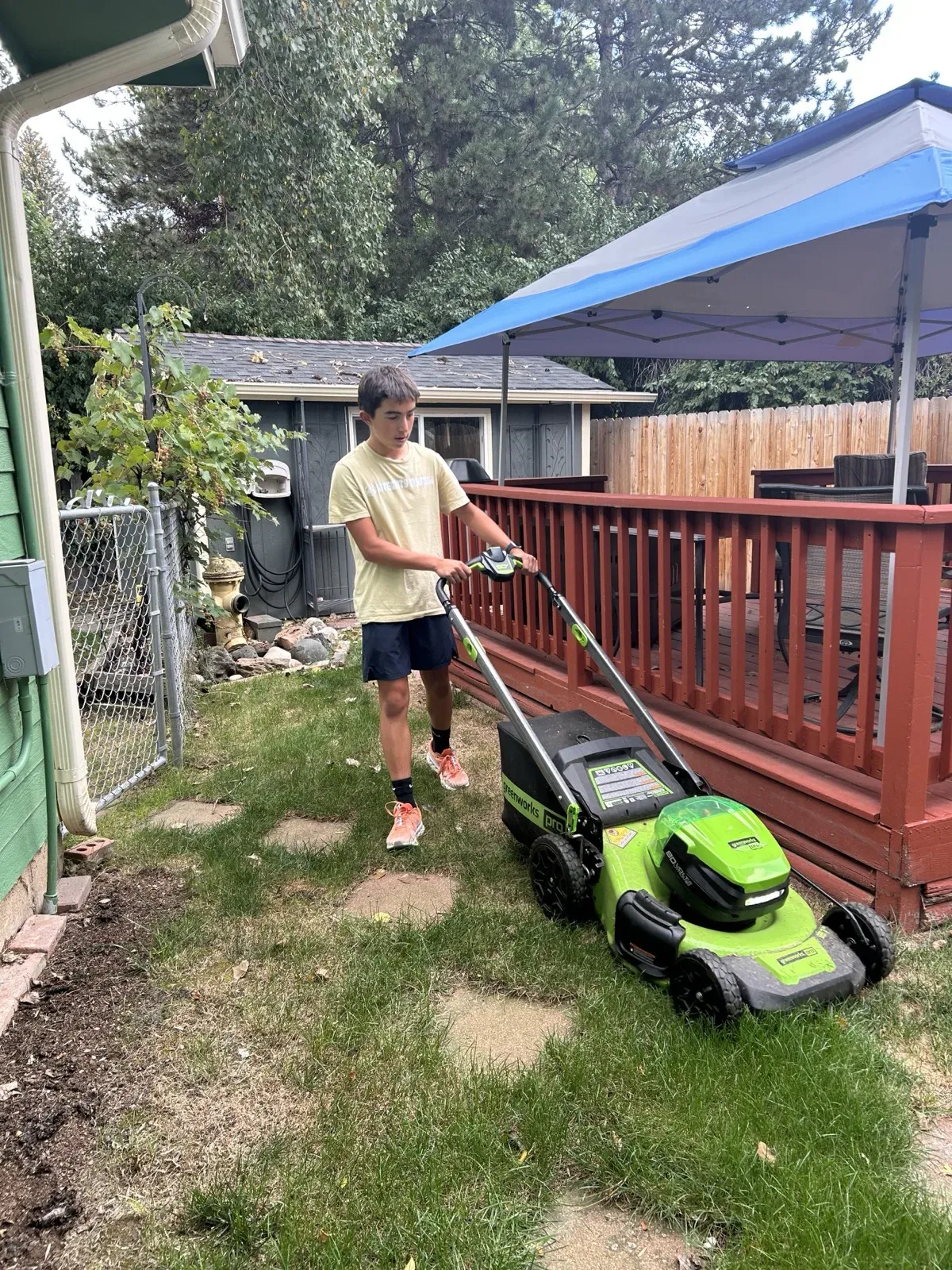 Oakley mowing a lawn in Fort Collins